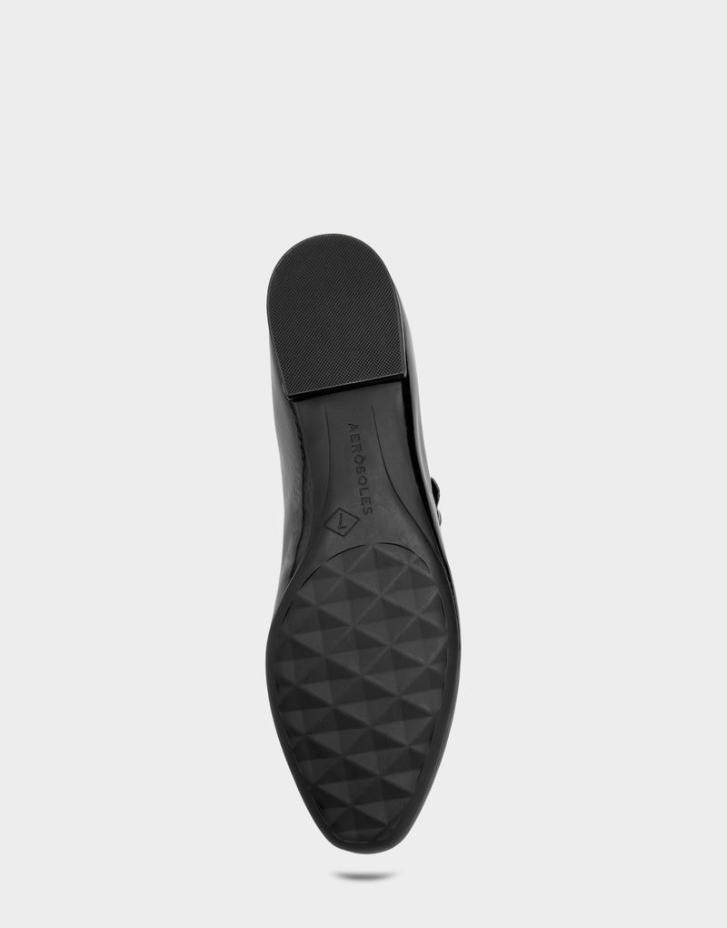 Comfortable Women's Flat In Black Patent Faux Leather Bottom View