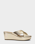 Comfortable Women's Wedge Sandal in Soft Gold Faux Metallic Leather Side View
