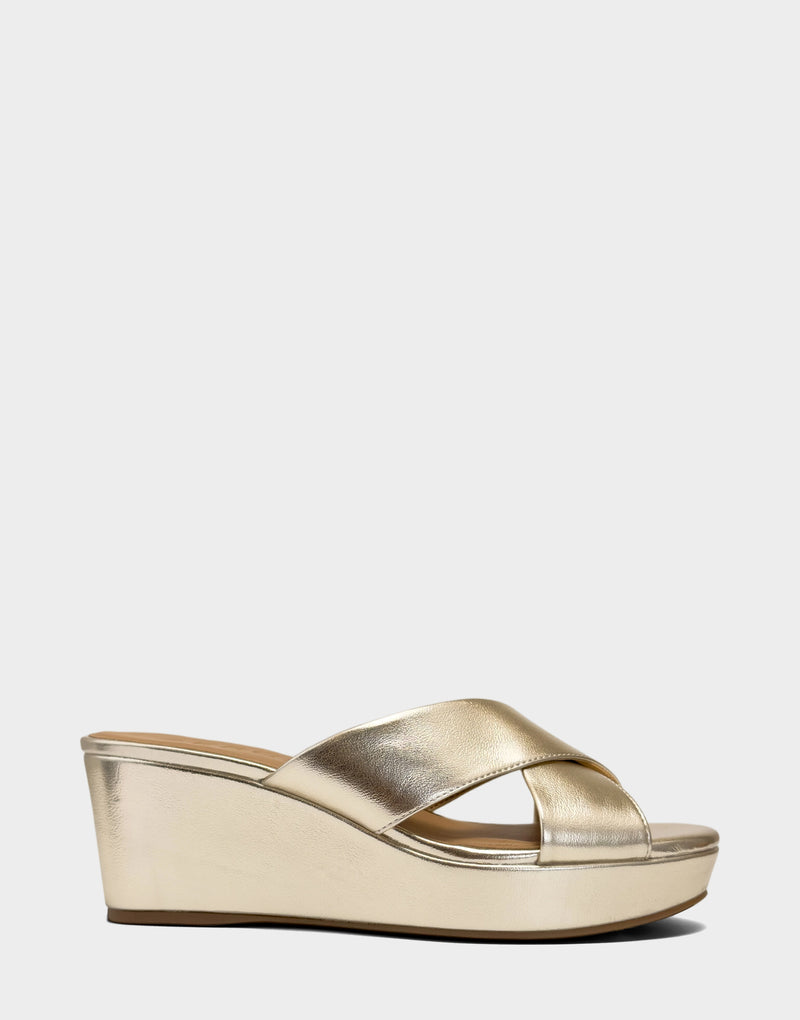Comfortable Women's Wedge Sandal in Soft Gold Faux Metallic Leather Side View