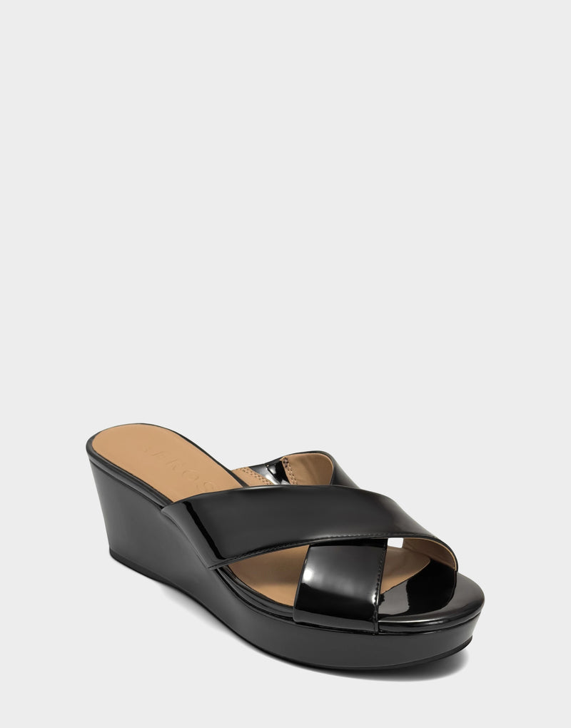 Comfortable Women's Wedge Sandal in Black Faux Patent Side Angle View