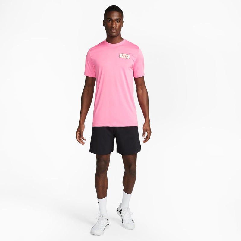 Nike Dri-FIT Fitness T-Shirt in bright pink with a lightweight fabric and logo detail on the chest, front view.