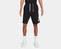 Nike French Terry Alumni Shorts in black with white drawstring and oversized logo on the left leg, front view worn.