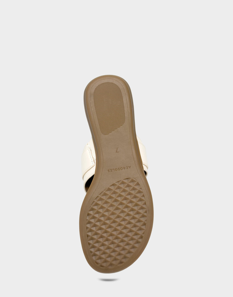 Comfortable Women's Flat Sandal in Cream Faux Leather Bottom View