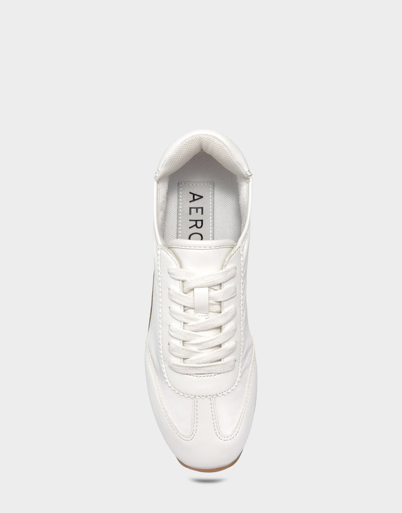 Comfortable Women's Sneaker in White/White Nylon/Faux Leather, top view