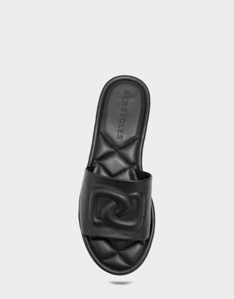 Comfortable Women's Flat Sandal in Black Faux Soft Leather, top view