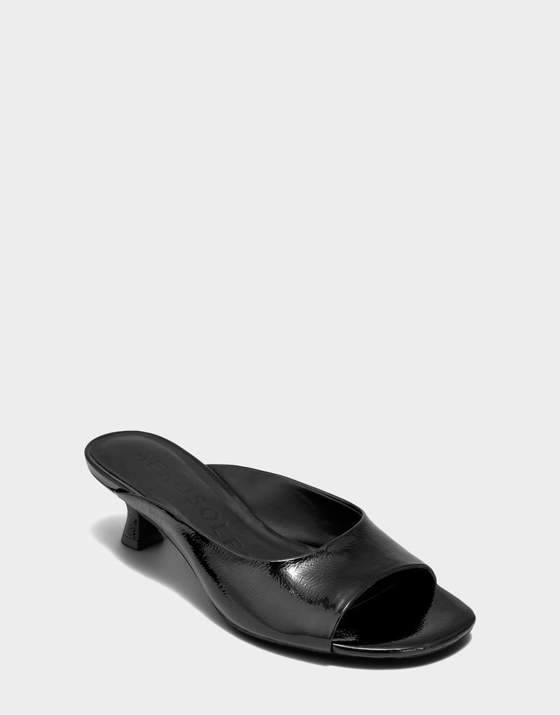 Comfortable Women's Heeled Sandal in Black Faux Crinkle Patent Side Angle View