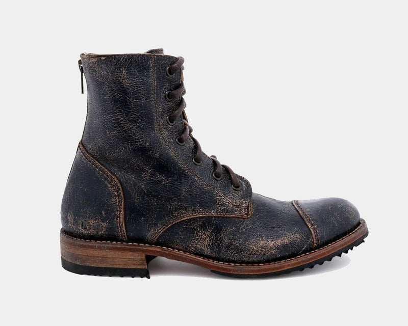 Bed Stu Protege boots in distressed black leather with cap toe design, lace-up closure, and leather outsole, side view.