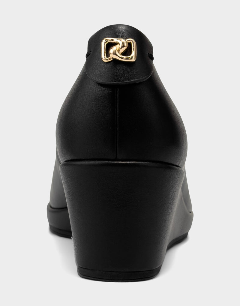 Comfortable Women's Dress Wedge in Black/Black Faux Soft Leather, rear view with emblem