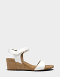 Comfortable Women's Wedge Sandal in White Faux Leather Side View